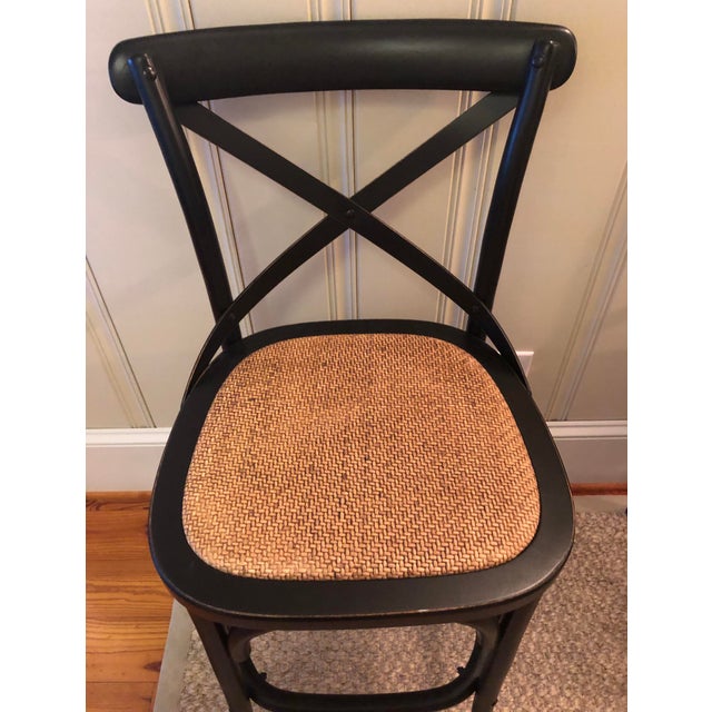 Brand new, unused set of 4 counter stools made by Furniture Classics. Frame is wood in black finish. Seat is rattan. These...