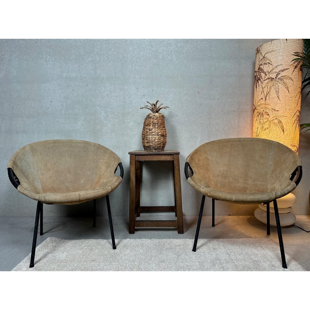 Set of 2 suede (camel) bucket chairs, also called 'balloon chairs'. Designed by Lusch & Co. Black painted metal base....