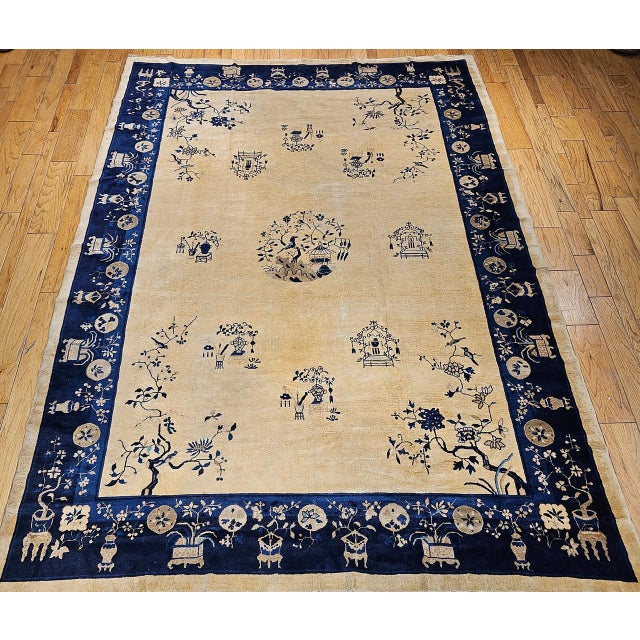 This vintage Chinese Peking rug from the late 1800s is a rare and refined example of the traditional Chinese weaving...