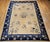 This vintage Chinese Peking rug from the late 1800s is a rare and refined example of the traditional Chinese weaving...