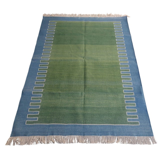 Cotton Zig Zag Pattern Reversible Rug. Fringe runs along 3' sides. These special flat-weave dhurries are hand-woven with...