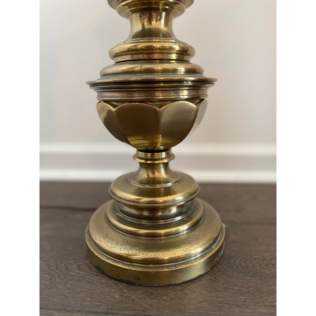 Vintage brass Stiffel lamp. You can feel the quality in the weight. Scallop design on the base. Beautiful iconic piece.