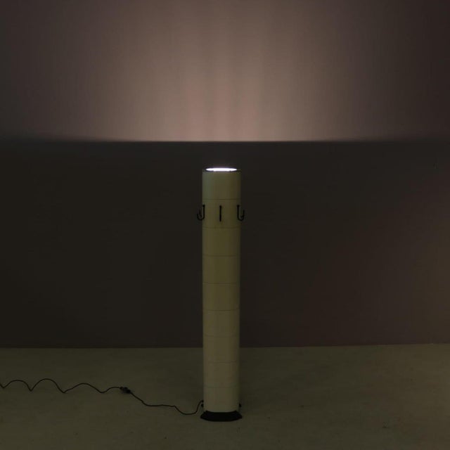 A beautiful combined coat hanger and floor lamp designed by gae aulenti, manufactured by stilnovo in italy in 1970. This...