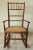 Wonderful antique early 20th century RJ Horner style faux bamboo child's rocking chair with cane seat. Solid wood rocker...