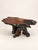 Vintage redwood burl coffee table with a freeform live-edge top and natural root base. The rich grain and sculptural shape...