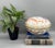 Exquisite, large Chinese porcelain covered box features a vibrant famille rose decoration of a dragon and phoenix amid...
