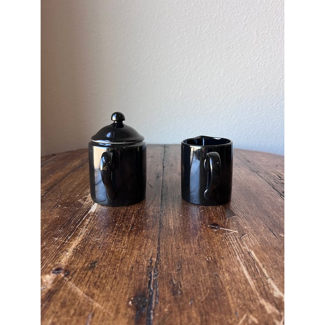 Vintage 1978 Fitz and Floyd Black Glazed Sugar Bowl with lid and Creamer Made in Japan Sugar - 5.5” width, 2 7/8” depth...