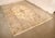 High Quality Hand Tied 11' x 18' Fringed Area Rug. Rug Features Cream Center Medallion Surrounded by Smaller Motifs. The...
