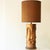 Large Unique Copper walnut wood floor/table lamp with faces, new lampshade by René Houben, 1970. This stunning lamp base...
