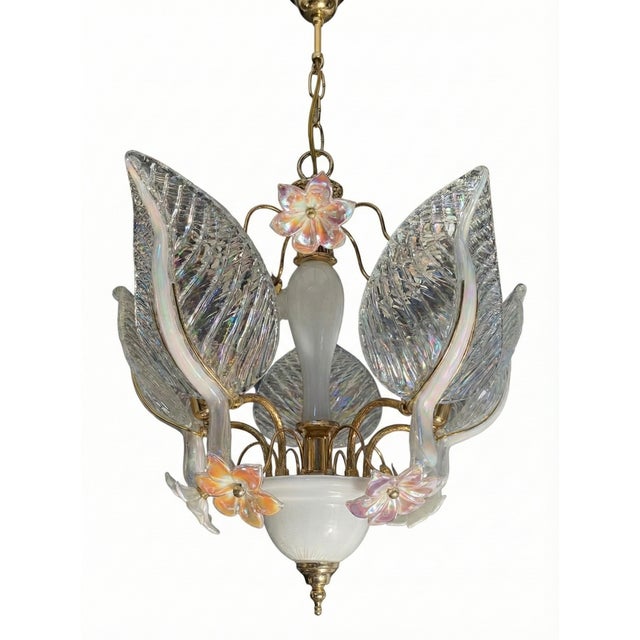 This exquisite chandelier is a stunning blend of Hollywood Regency glamour and organic design, inspired by the finest...