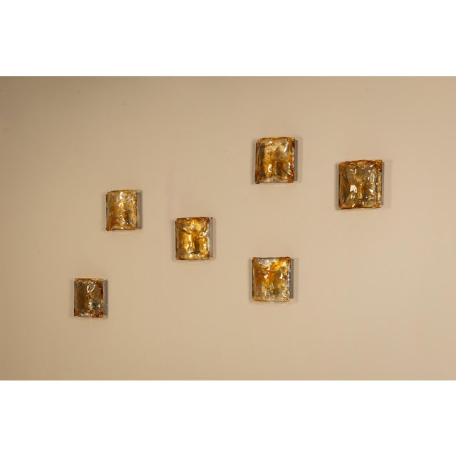 An interplay of light and texture defines this set of wall appliques, crafted in the spirit of Carlo Nason’s celebrated...