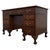 A handsome English Edwardian pedestal desk dating from the early 20th century, finely constructed in mahogany and...