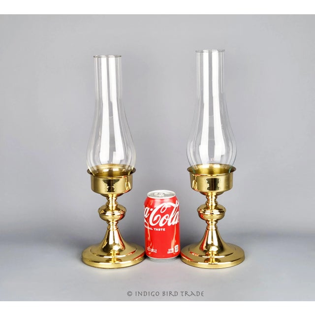 Pair of Vintage Brass Candle Holders with Hurricane Glass Shades These candle holders are made from solid lacquered brass...