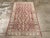 This Early 20th century Turkish Ghiordes rug, measuring 3' 6" x 5' 9", reflects the region’s long-standing tradition of...