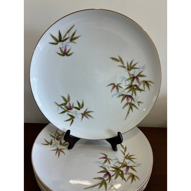 Refined mid century modern dinnerware from Sango in the Bali pattern. Each plate displays graceful green bamboo branches...