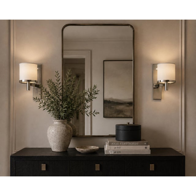 Sophisticated pair of contemporary wall sconces designed and manufactured in Los Angeles, California by Paul Marra...