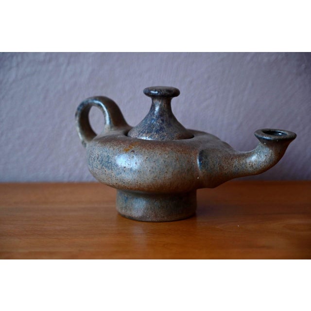 Strangely captivating, this stoneware teapot tells its own story of studio ceramics from the 1960s and 70s, when artisans...