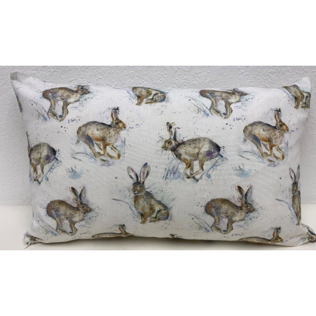 Large Bolster Pillow Adorned With a Fluffle of Playful Rabbits- Made in UK. Measures 24" X 7" X 15" This playful rabbit...