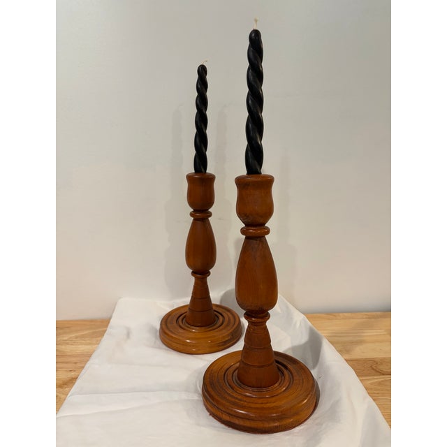 Beautiful and tall, velvet bottomed, handmade wooden candle stick holders. Vintage