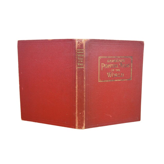 This antique folio-sized book, titled "Hammond's Perpetual Atlas of the World," is a fascinating piece of pre-WWII...