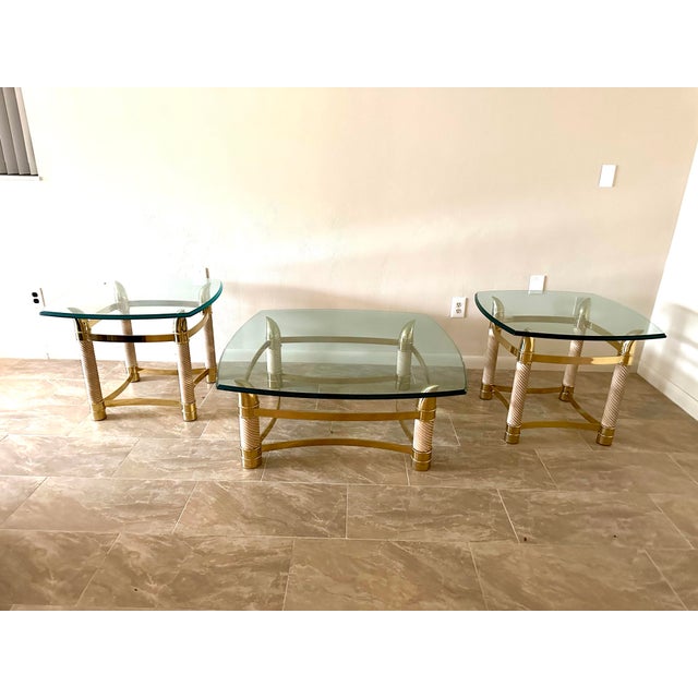 Beautiful bright brass with horn shaped legs. Frosted white swirl accents adorn this beautiful Italian made set