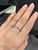 A dainty alexandrite band in solid 14k real white gold, finished with fine milgrain edging. Stackable and elegant, with...