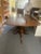 A signed Potthast Brothers double pedestal dining table. A classic early to mid 1900s antique piece crafted by the...