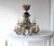 A massive Empire, Napoleon III-style French chandelier with tiers of putti or cherubs with navy blue-black globes with...