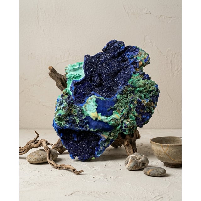 A substantial natural Azurite and Malachite specimen selected for its vivid blue-green contrast, cavernous...