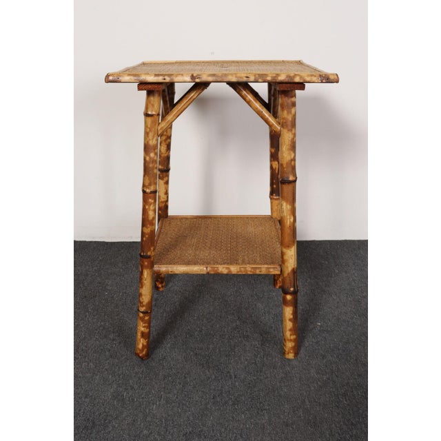 Antique Aesthetic Movement plant stand/side table (ca. early 20th Century, USA). Composed of a burnt bamboo/faux-tortoise...