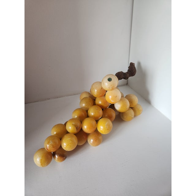 A show-stopping cluster of large Italian alabaster grapes—substantial, smooth, and beautifully hand-carved. These vintage...