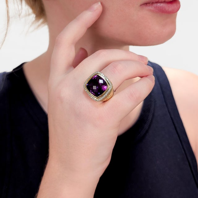 A fine signed gold, amethyst, and diamond Albion cocktail ring. By David Yurman. In 18 karat yellow gold. With a central...