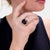 A fine signed gold, amethyst, and diamond Albion cocktail ring. By David Yurman. In 18 karat yellow gold. With a central...