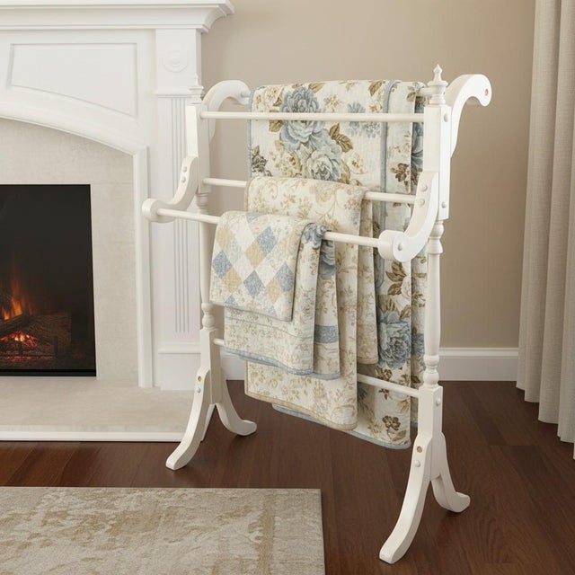 A vintage white painted wood quilt rack, crafted in the late 20th century, likely American made in the 1980s–1990s when...