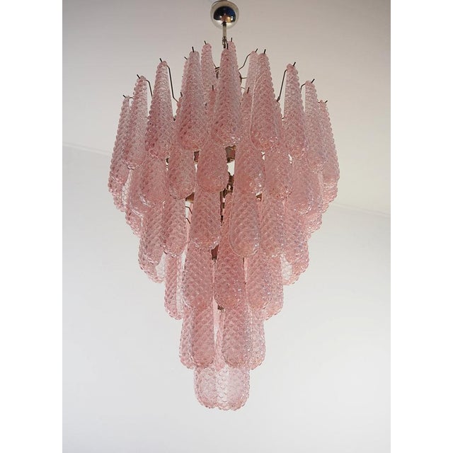 Gorgeous italian vintage chandelier made from 85 great hourglass murano glass. 7 levels. Nickel plated metal frame....