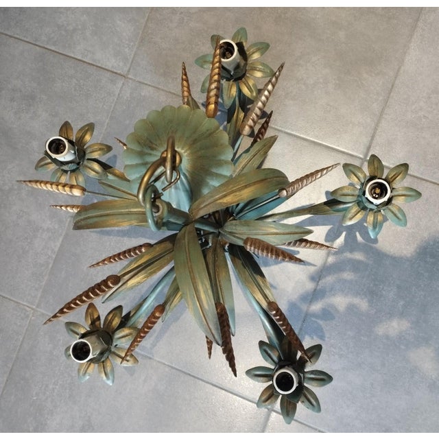 The "wheat ears" pendant light, attributed to the masca company and dating from around 1970, is an iconic example of...