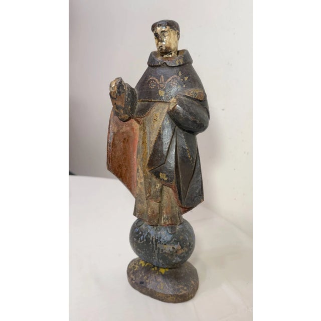 The rare antique 17th century hand carved wooden sculpture of Saint Vincent Ferrer is a unique and intricately crafted...