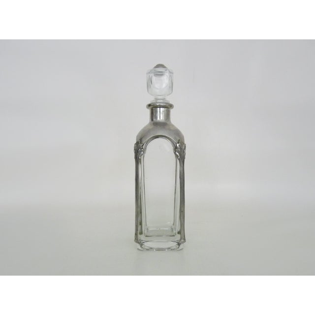 Stunning crystal and silver-plated metal carafe A crystal and silver-plated metal carafe in perfect condition. Height: 31...