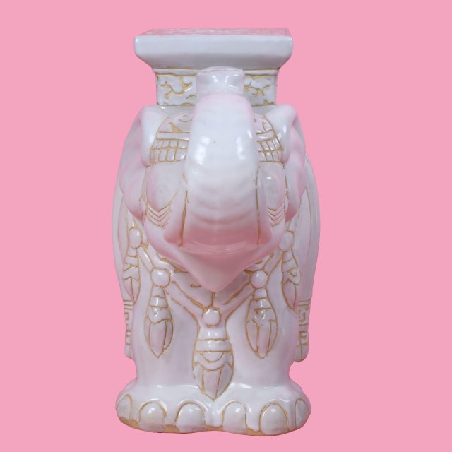 A single garden seat modeled as a white elephant, glazed for a luminous finish and endless charm. Use it as a side table,...