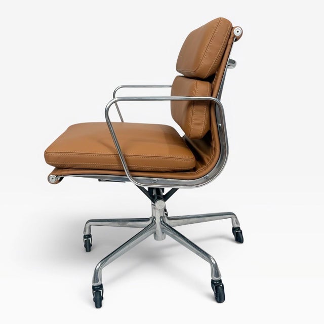 A beautifully restored Eames Aluminum Group Soft Pad Management Chair, originally designed by Charles & Ray Eames....