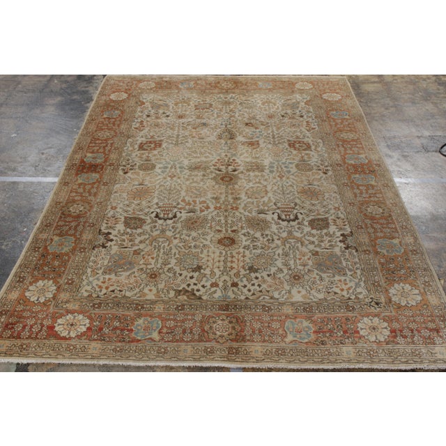 Hand Knotted in wool, a very beautiful antique Tabriz garden rug design originating circa 1920-1930, now joining Rug &...