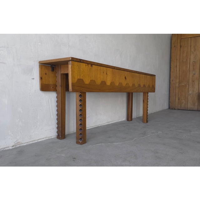 This incredible drop leaf dining table is a Mid Century Rustic European Style Craftsman Masterpiece. The design is truly...