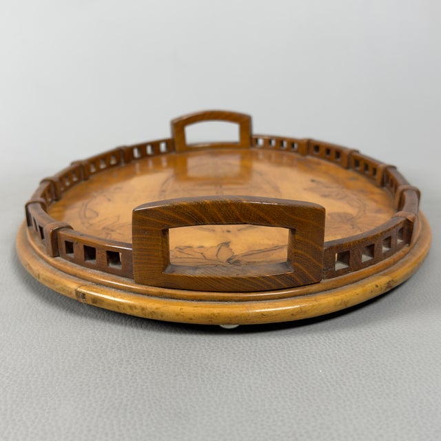 A truly unique piece, rich in history and warmth, as well as a magnificent example of artisanal cabinetmaking. This rare...