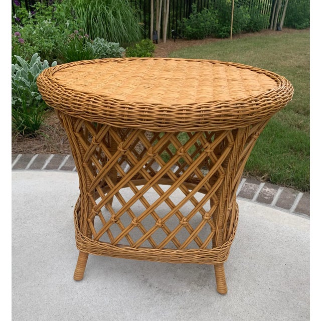 Large wicker rattan and cane oval side table. Great condition, very little wear, excellent quality, sturdy. Measures-...
