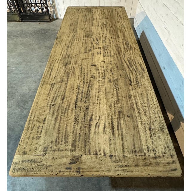 A superb Quality Solid Oak Farmhouse Dining Table. Dating to the early 1900s and of excellent quality construction this...