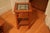 I purchased this solid wood (I think oak but not sure) accent table for my arts and crafts-styled living room circa 2003...