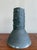 This striking studio pottery vase is a bold expression of form and texture—perfect for collectors of modern ceramics or...