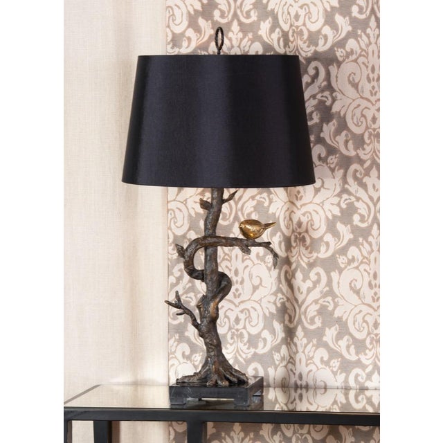 Brighten your home decor with this nature inspired lamp. Crafted in cast composite, the bronze finished tree with its...