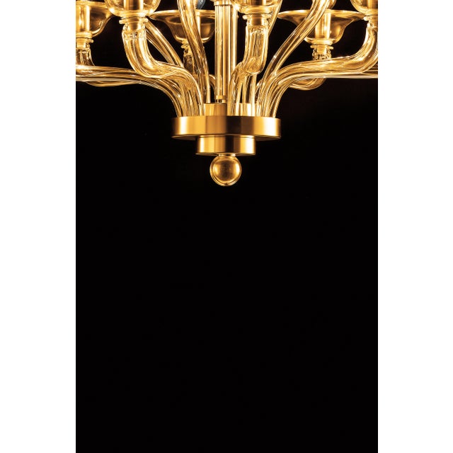 Elegant chandelier in amber color made in Murano glass and plating gold24k metal frame. For classical and modern...