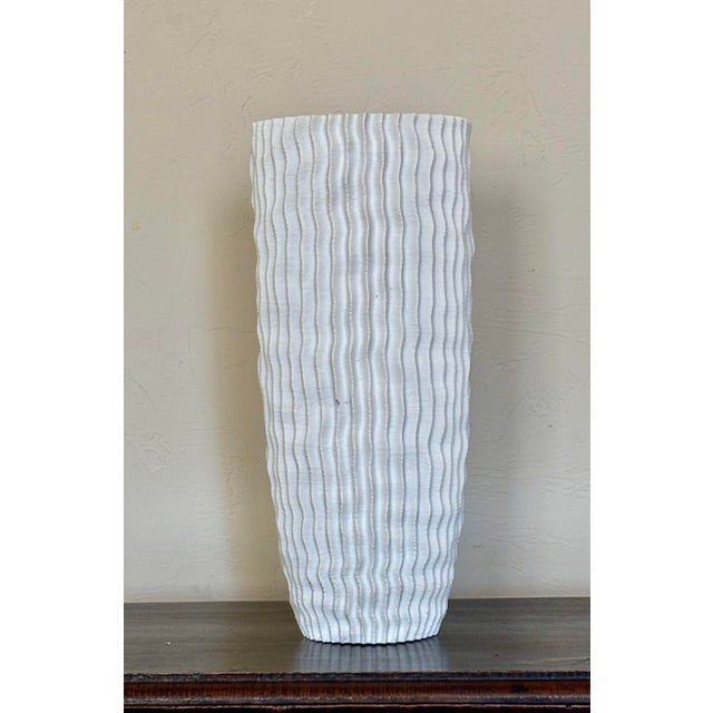 Elevate your tabletop or mantel with this striking "Cactus" vase by luxury artisan brand Lily Juliet. Crafted from high-...